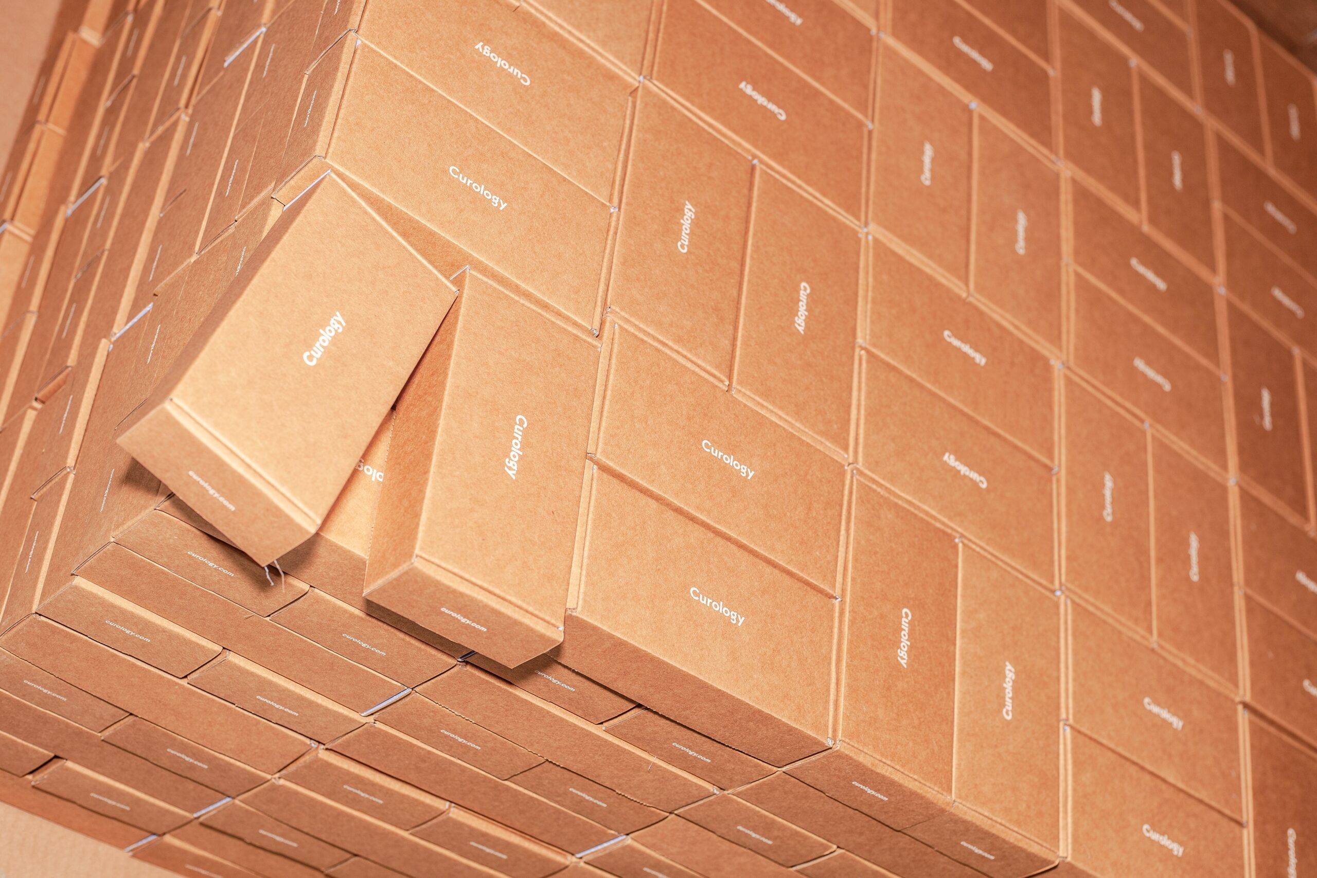 Boxes. Credit: Curology & Unsplash